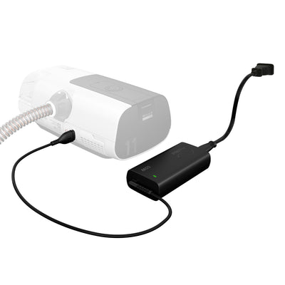 ResMed AirSense 11 65W AC power supply adapter angled view