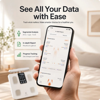 A hand holds a smartphone displaying a health tracking app interface, with a white foot scanner device in the background and promotional text at the top about seeing all your data with ease.