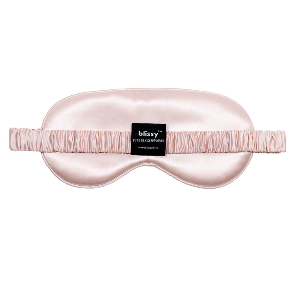 Cushioned Blissy pink mulberry silk eye mask showing gentle contoured design