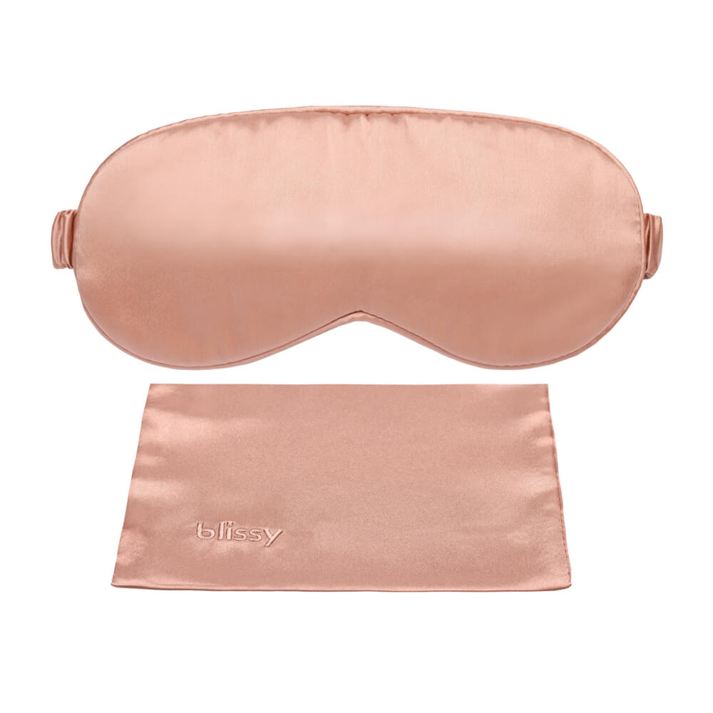 Blissy rose gold mulberry silk sleep mask displayed in luxury magnetic gift box
