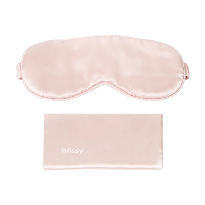Front view of cushioned Blissy 22-Momme mulberry silk sleep mask in petal pink