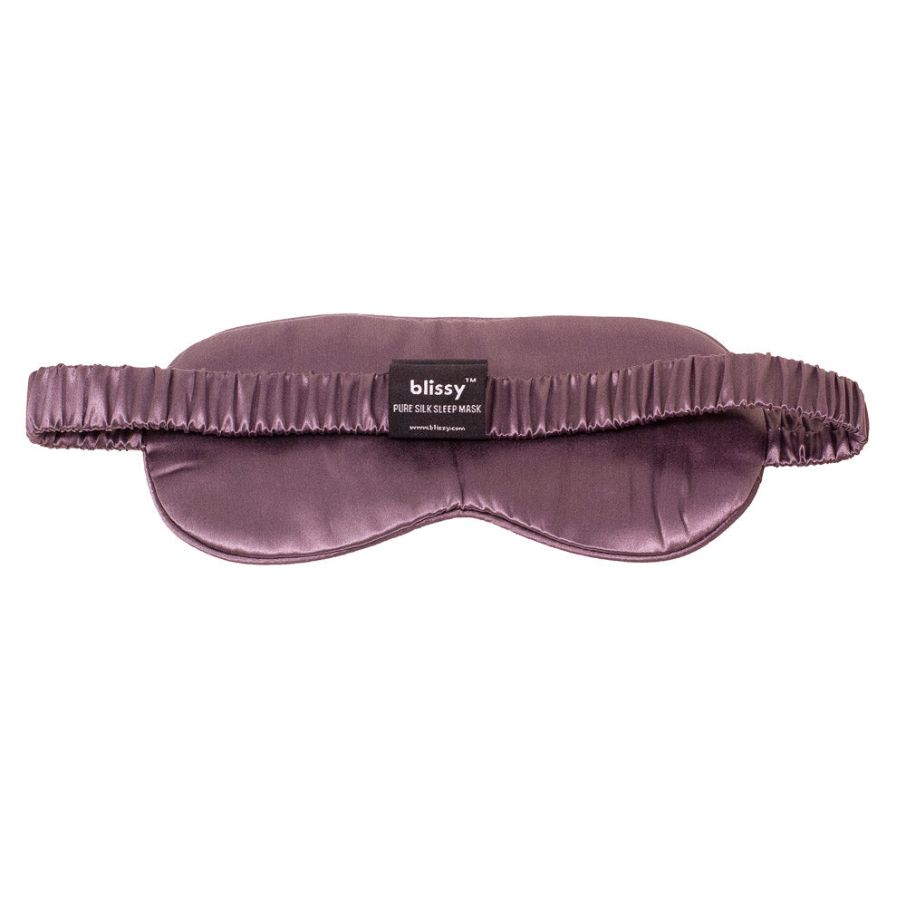 Back view of Blissy plum silk eye mask showing comfortable elastic silk-covered headband