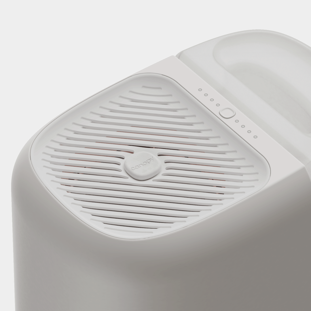 Top view of Canopy large room evaporative humidifier in moonstruck gray showing control dial