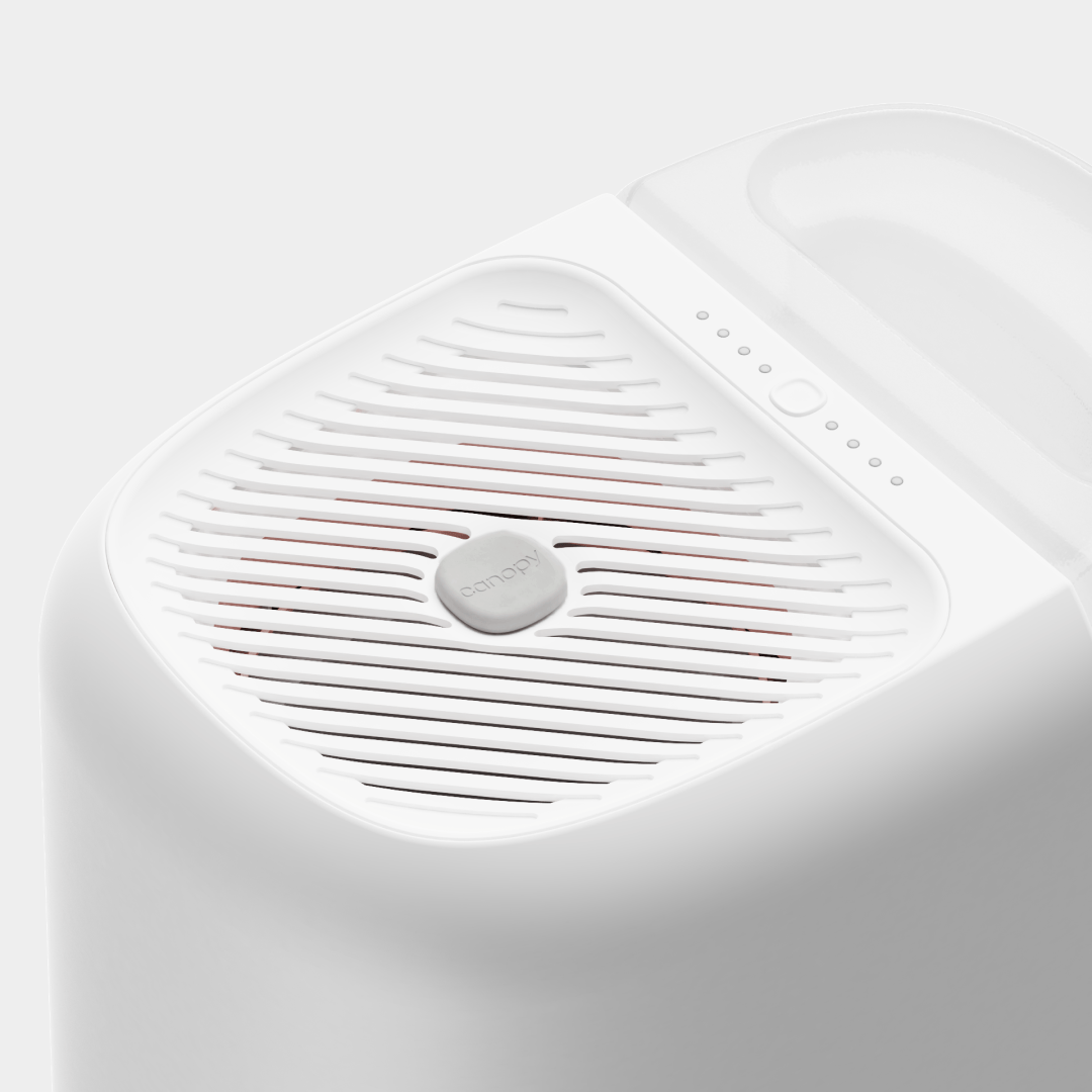 Top view of Canopy large room humidifier in white showing mist-free evaporative fan grill