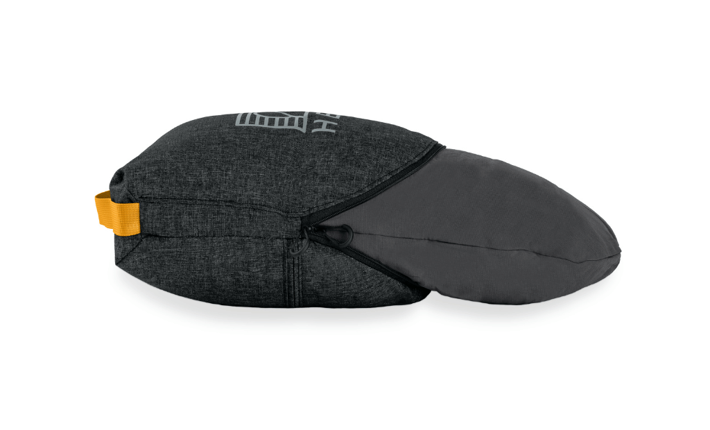 Demonstration showing HEST Pro pillow unfolding easily from compact pack into sleep mode