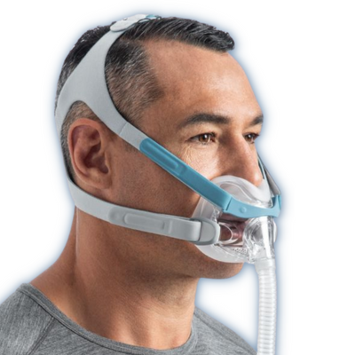 Adult male wearing Fisher & Paykel Evora Full compact CPAP mask with headgear