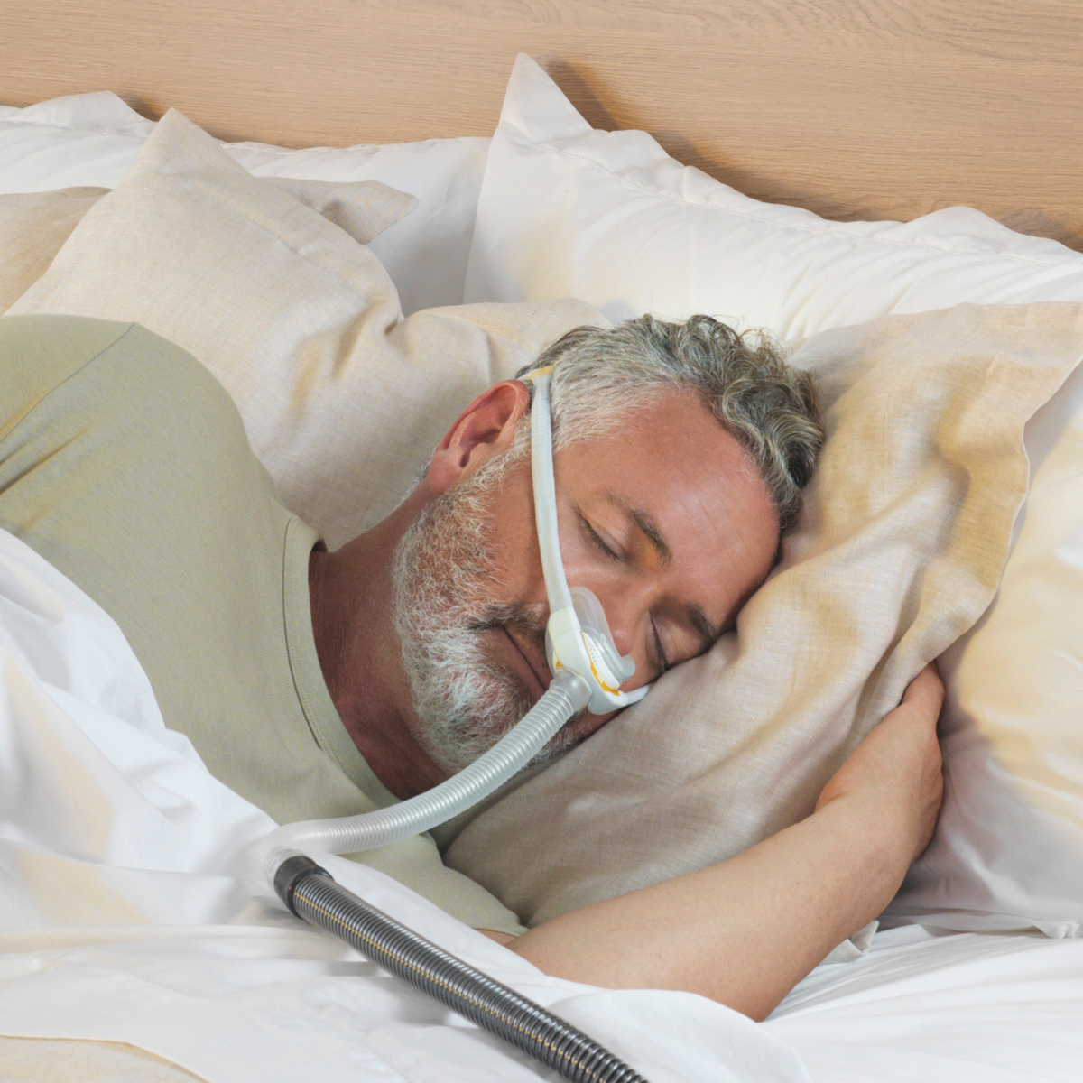 F&P Solo Pillow CPAP Mask - Man Sleeping