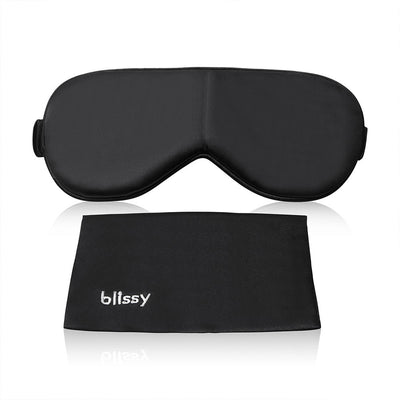 Front view of Blissy black mulberry silk eye mask showing soft cushioned contouring
