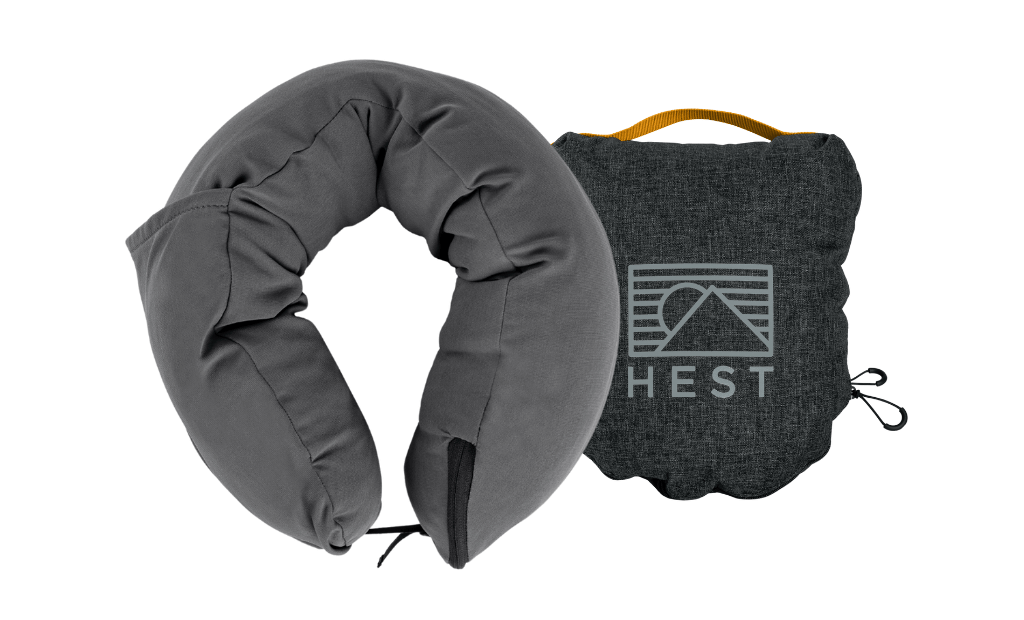 HEST Pro ergonomic memory foam travel pillow in compact sleep configuration