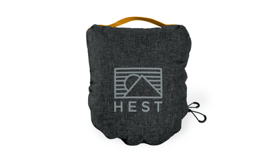 HEST Pro travel pillow folded and zipped into protective water-resistant travel cover
