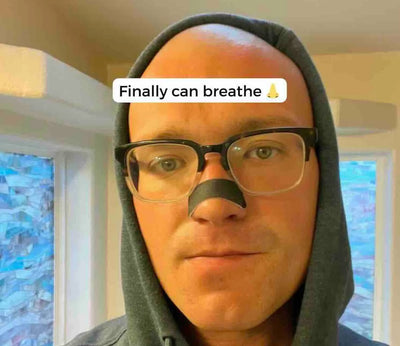 Customer testimonial and verified review praising breathing benefits of Hostage Nose Strips