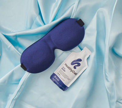 Individual consuming HealthyCell REM Sleep MicroGel directly from sachet before bedtime
