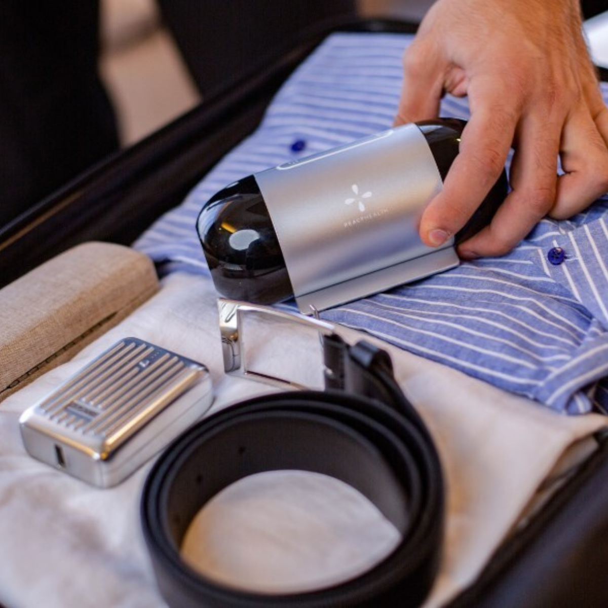 Luna TravelPAP travel CPAP machine packed in a suitcase
