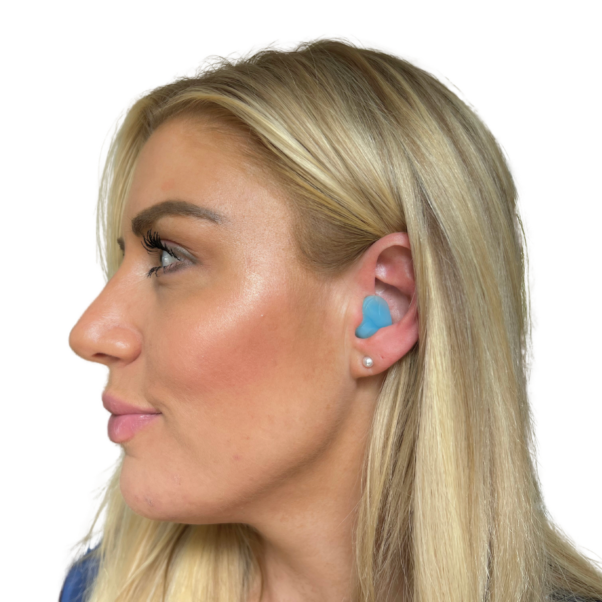 Model demonstrating proper insertion and fit of Dryft Sleep silicone ear plug in ear canal