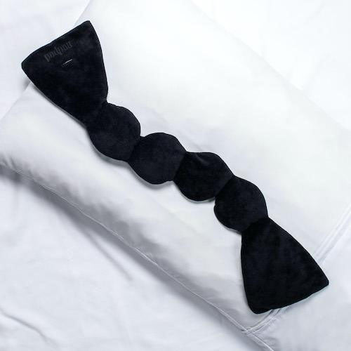 NodPod Black Onyx Eye Mask on Pillow