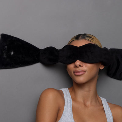 Nodpod weighted sleep mask in Black Onyx, worn while resting