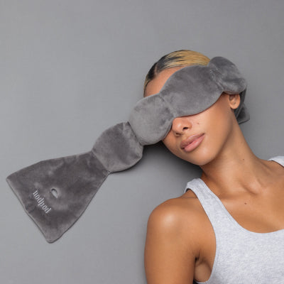 Nodpod weighted sleep mask in Elephant Gray, worn while resting