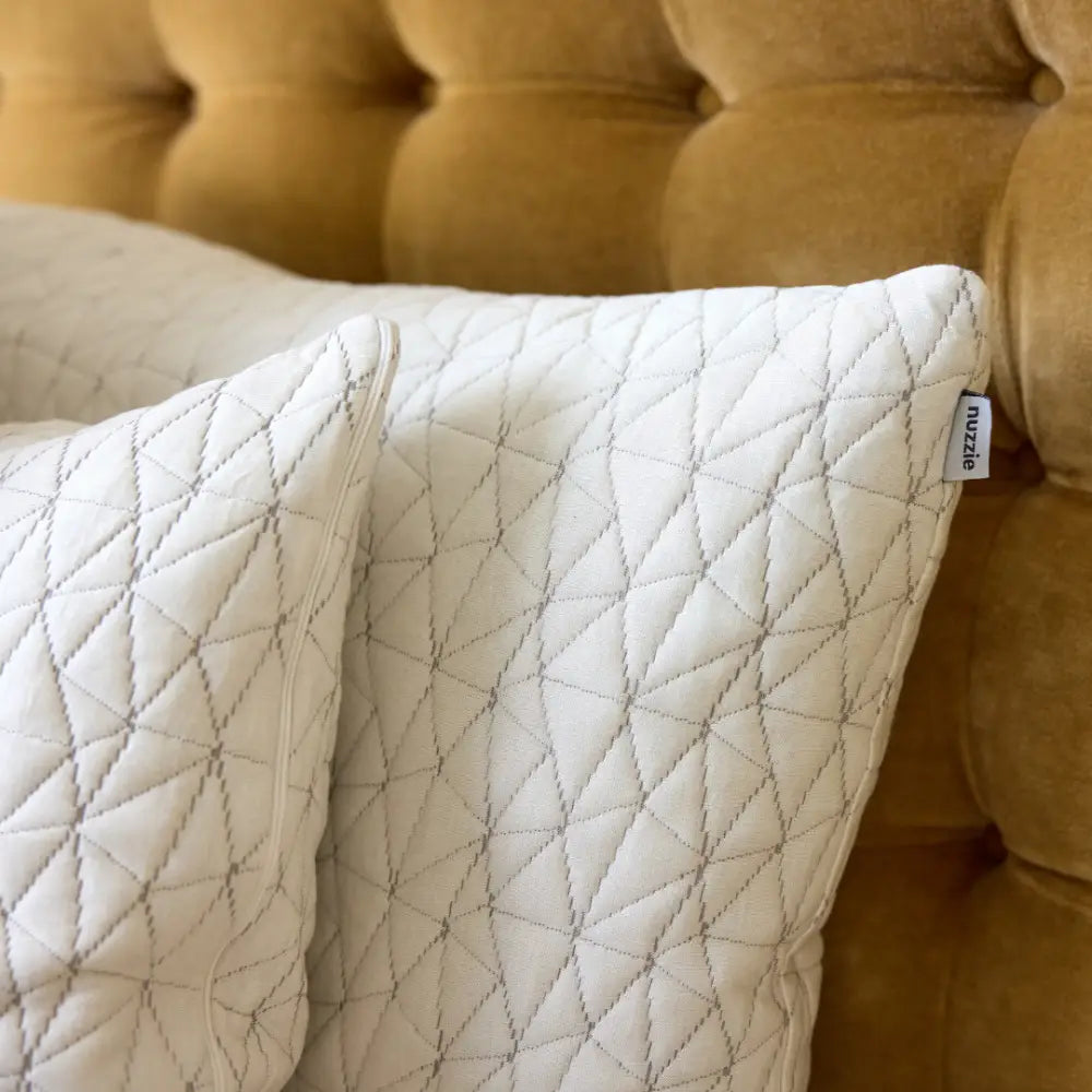 Nuzzie Cloud adjustable memory foam pillow in crisp classic white with removable cover