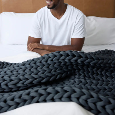 Nuzzie Ice Knit cooling weighted blanket crafted with silky bamboo yarn in northern grey