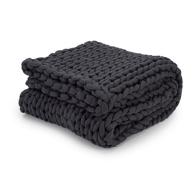 Nuzzie chunky knit weighted blanket in charcoal gray folded into compact neat square