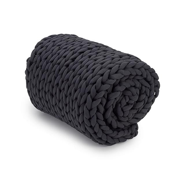 Nuzzie charcoal gray chunky knit weighted blanket rolled tightly for convenient travel or storage