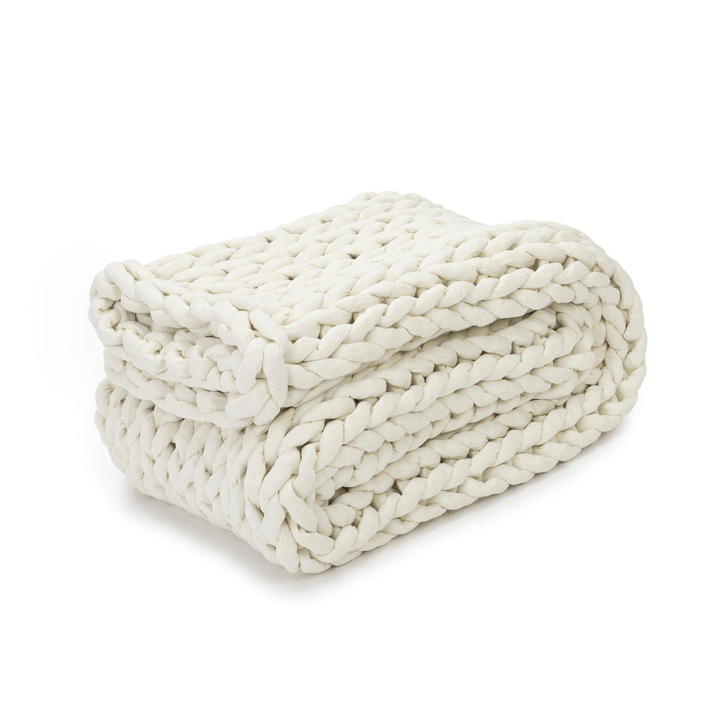 Nuzzie knit weighted blanket in Cream, folded