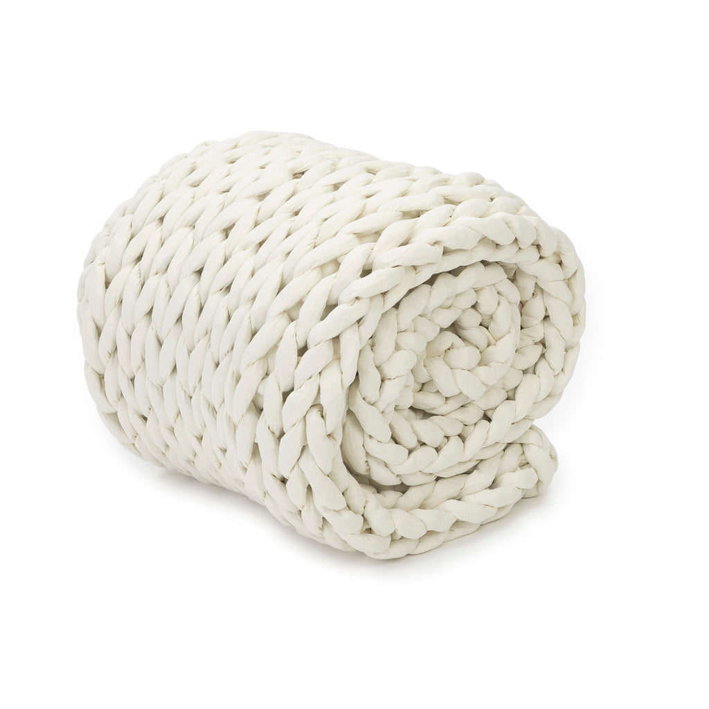 Nuzzie knit weighted blanket in Cream, rolled up