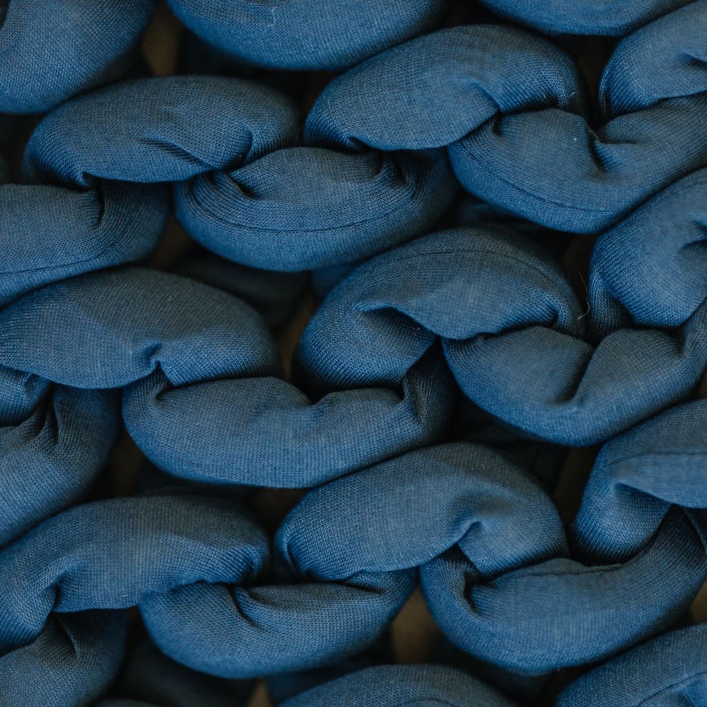 Nuzzie knit weighted blanket in Dusty Blue, close-up of the fabric