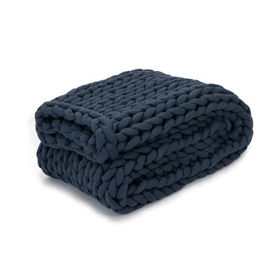 Nuzzie knit weighted blanket in Dusty Blue, folded