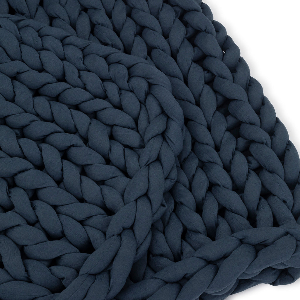Nuzzie knit weighted blanket in Dusty Blue, close-up showing the soft texture