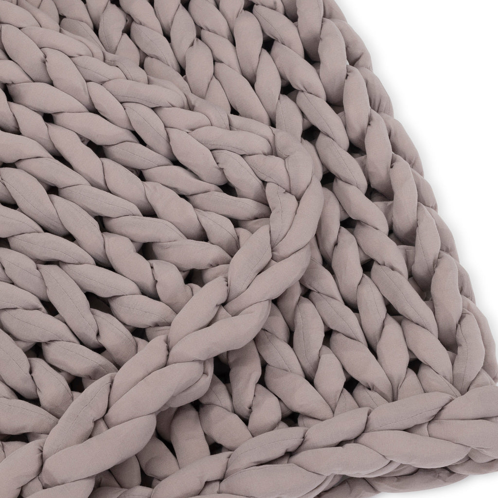 Nuzzie knit weighted blanket in Dusty Rose, close-up showing the soft knit