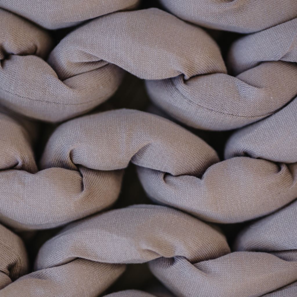 Nuzzie knit weighted blanket in Dusty Rose, close-up of the fabric