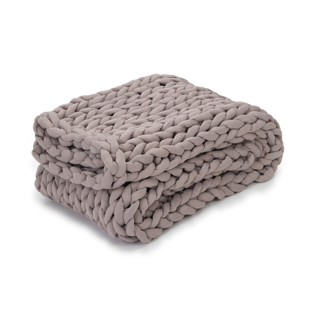 Nuzzie knit weighted blanket in Dusty Rose, folded