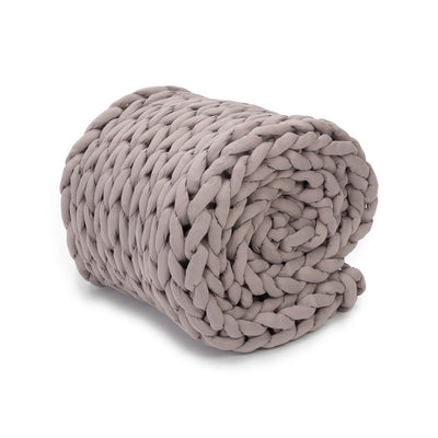 Nuzzie knit weighted blanket in Dusty Rose, rolled up