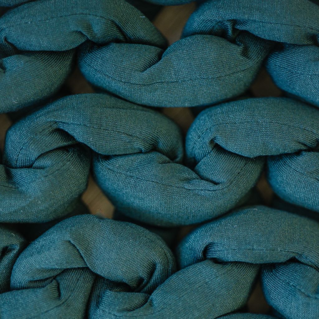 Nuzzie knit weighted blanket in Forest Green, close-up of the fabric