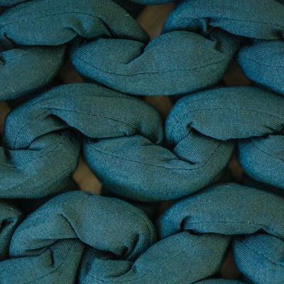 Nuzzie knit weighted blanket in Forest Green, close-up of the fabric