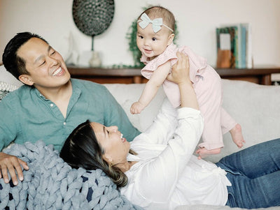 Nuzzie knit weighted blanket in Misty Grey, shared by a family