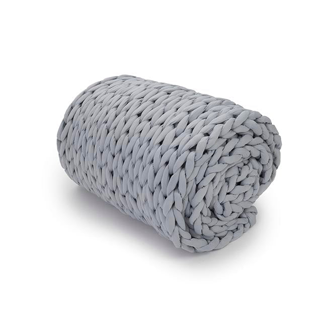 Nuzzie knit weighted blanket in Misty Grey, rolled up