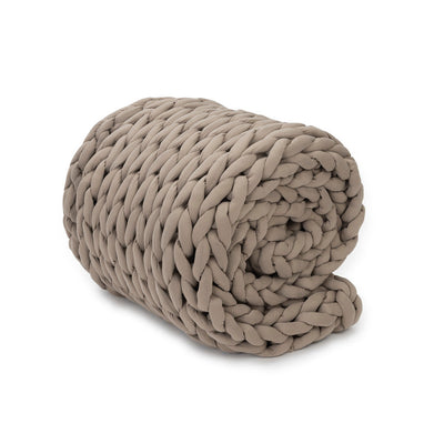 Nuzzie knit weighted blanket in Taupe, rolled up