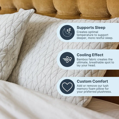 Person demonstrating adjustable loft by removing shredded foam fill from Nuzzie Cloud pillow