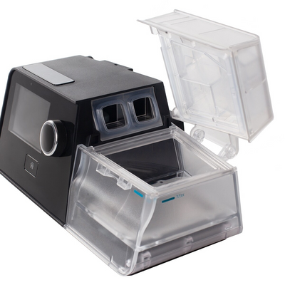 Angled view of open React Health Luna G3 cleanable humidifier water tub showing fill lines
