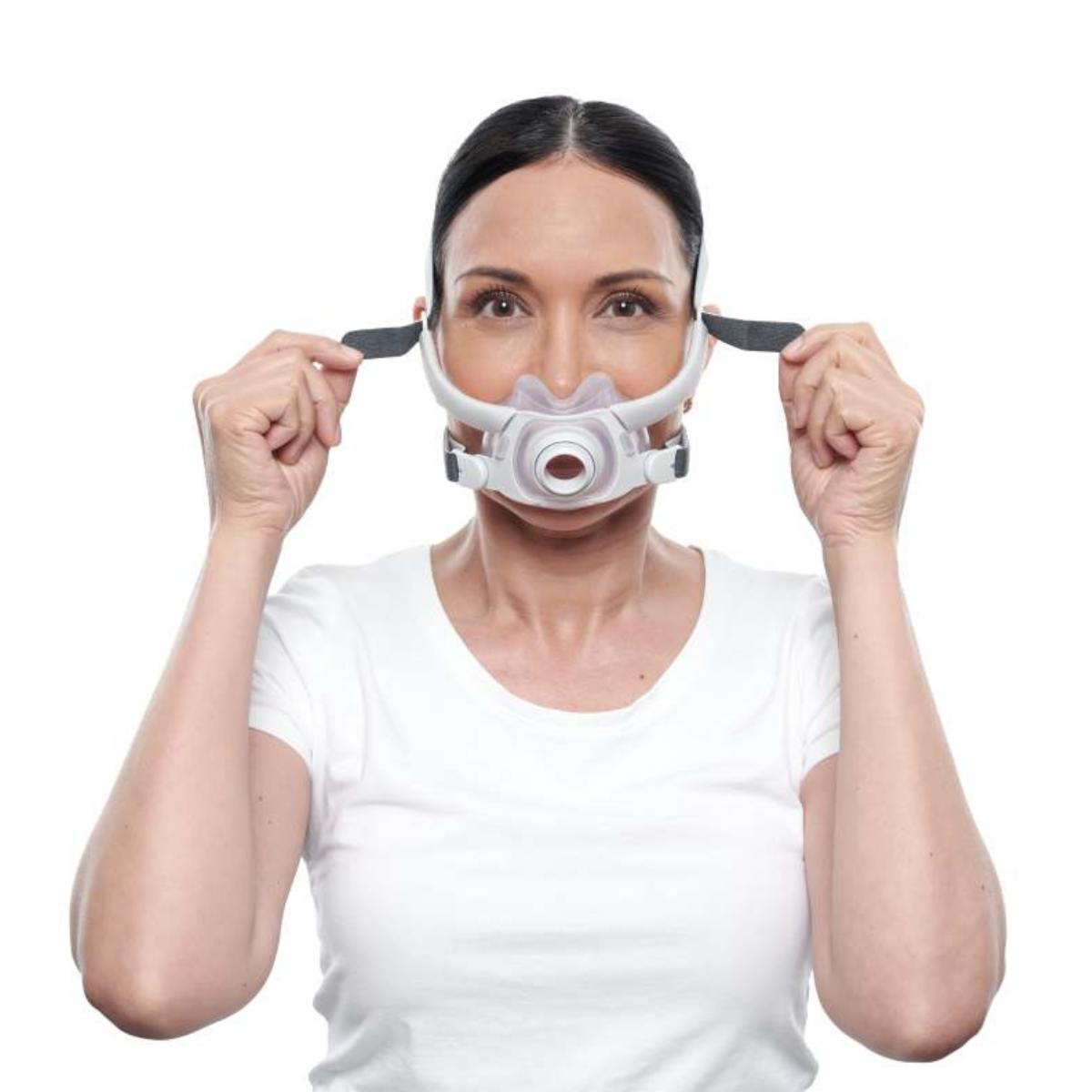 Female side sleeper wearing ResMed AirFit F40 ultra-compact full-face CPAP mask and headgear