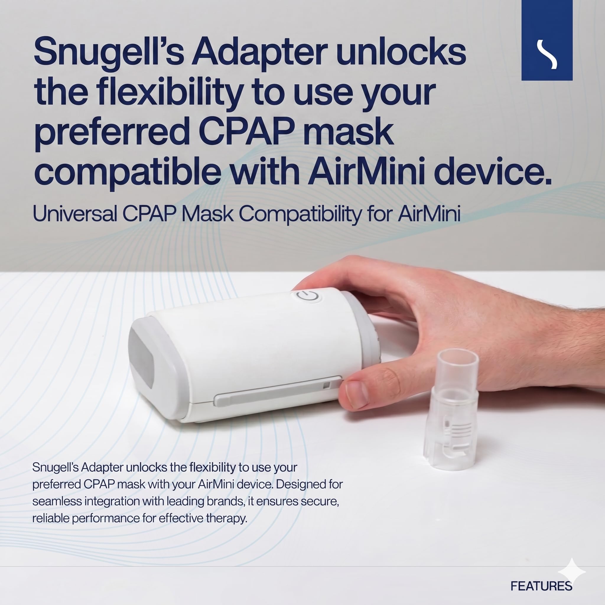 Snuggell's adapter for CPAP masks with a hand holding it on a white background