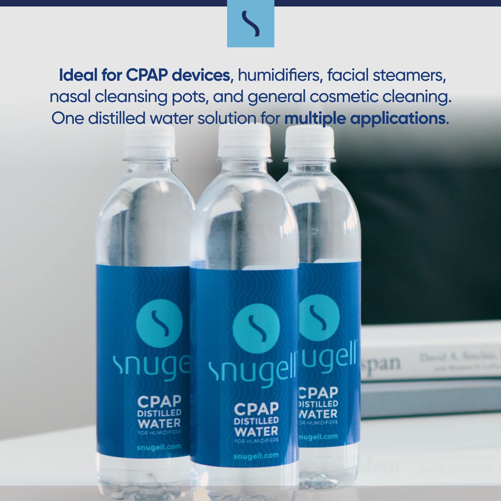 Three bottles of Snugell CPAP distilled water on a surface with promotional text.