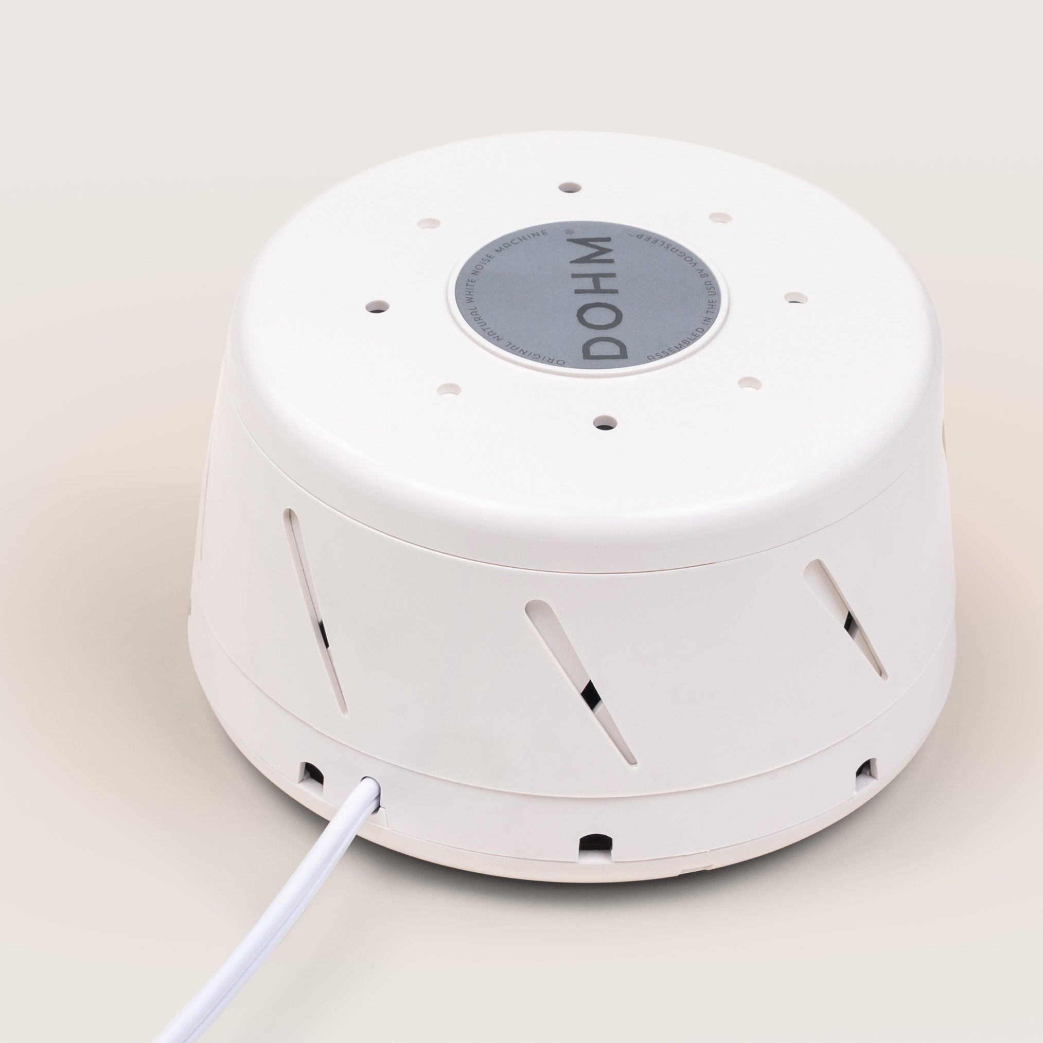 Top view of white Yogasleep Dohm Classic showing adjustable pitch and volume vents