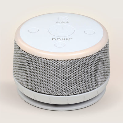 Top view of Yogasleep Dohm Nova sound machine showing rotary tone and volume adjustments