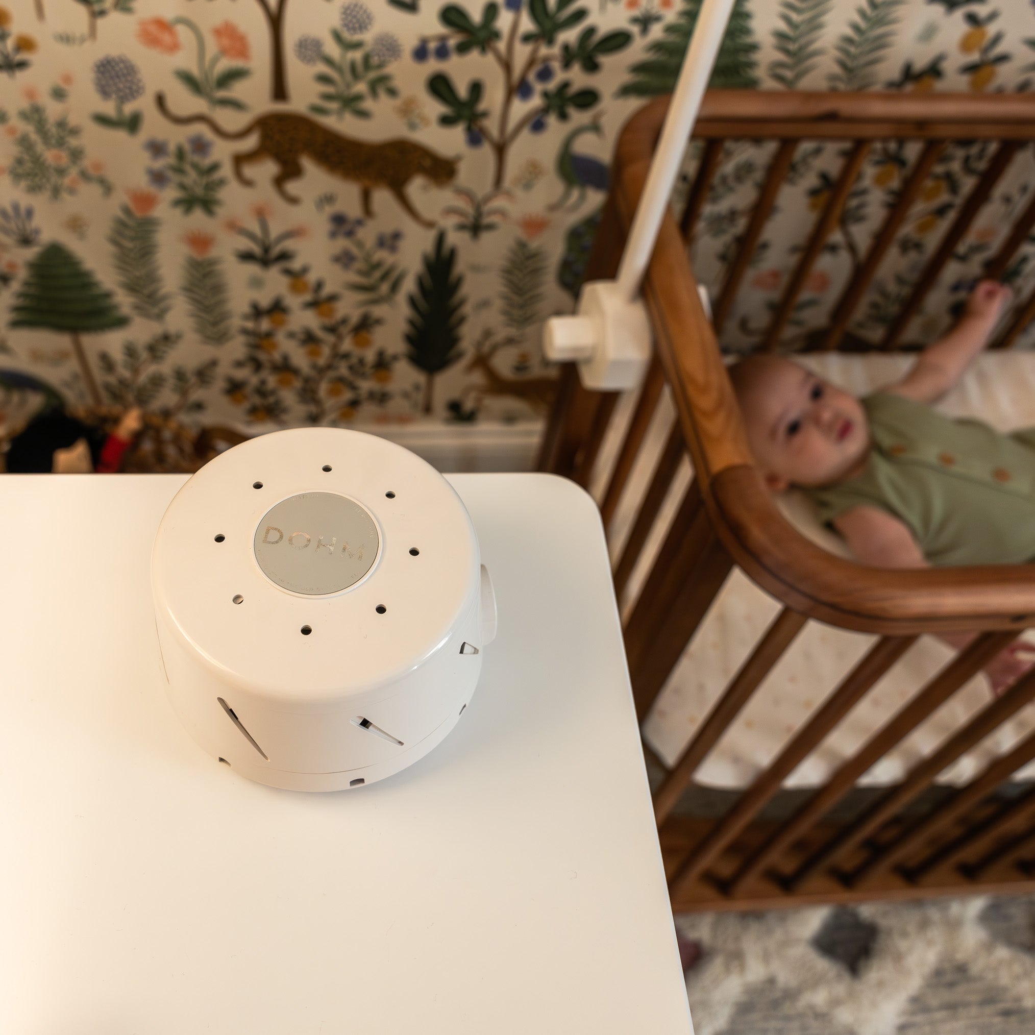 Yogasleep Dohm Classic white noise machine in serene bedroom environment for restful sleep
