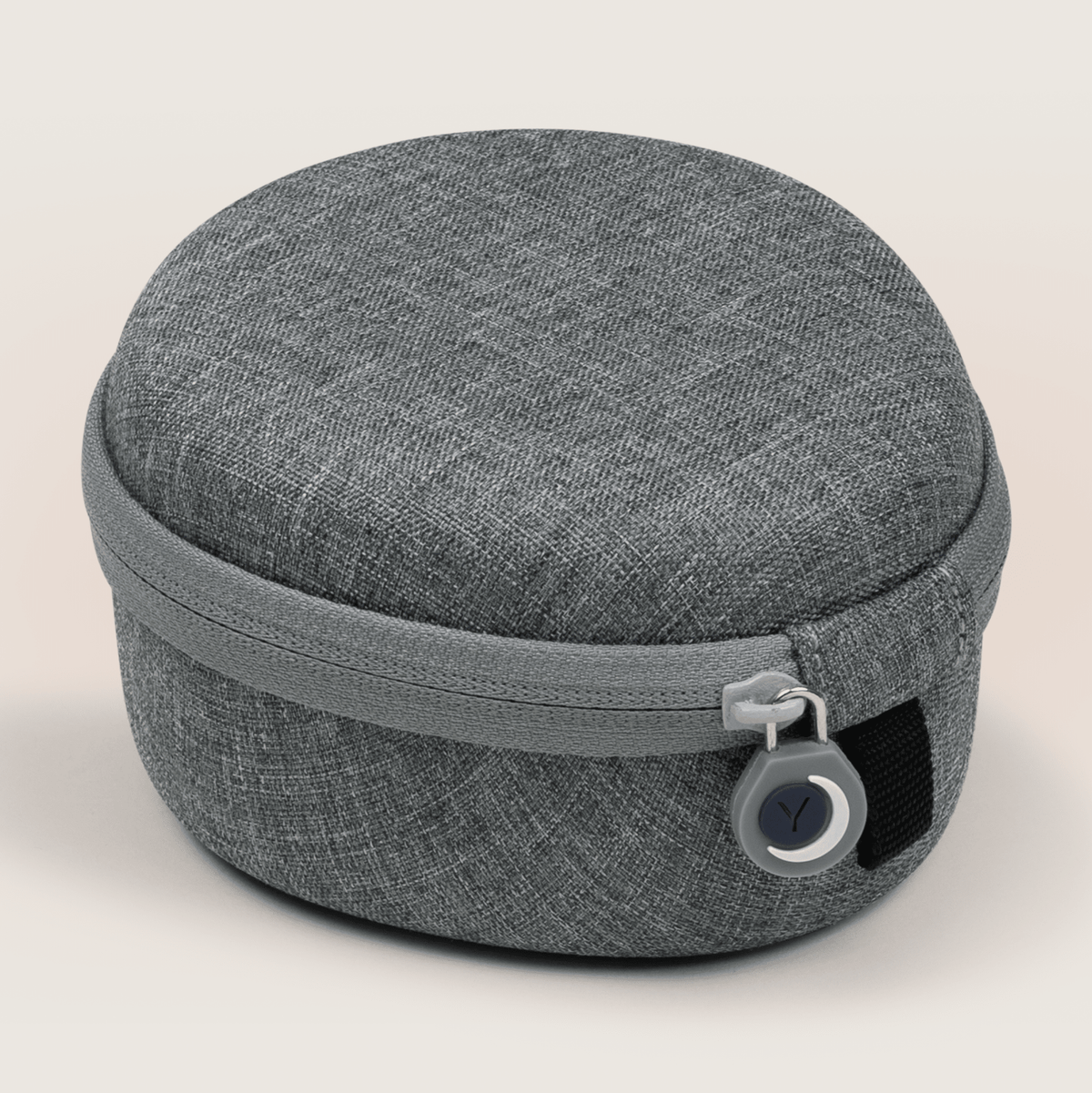 Interior zippered compartment and elastic straps inside Yogasleep medium travel case