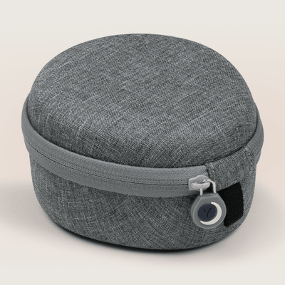 Interior zippered compartment and elastic straps inside Yogasleep medium travel case