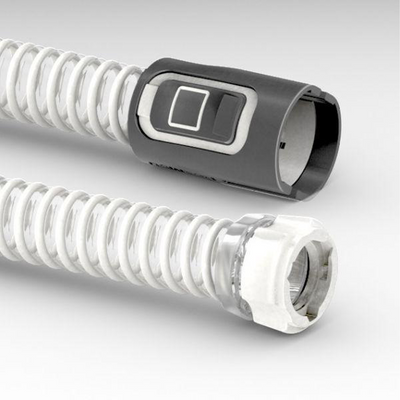 Coiled ResMed AirMini lightweight CPAP tubing with connectors